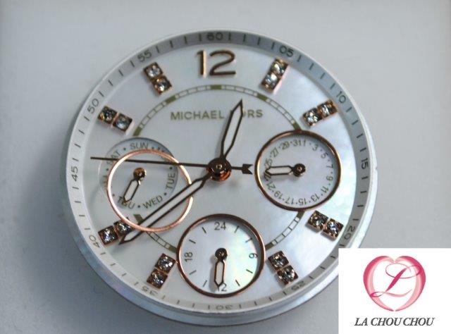 Michael Kors(マイケルコース) 腕時計　文字盤の輪が剥がれた　修理